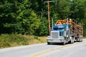 Logging Truck and Strawberry Truck Collide in Marshall County 